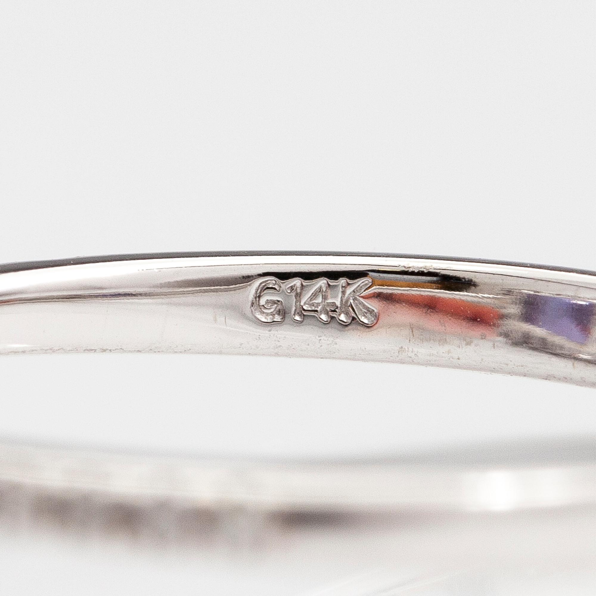 RING, 14K vitguld, tanzanit ca 2.50 ct och briljantslipade diamanter ca 0.25 ct tot.