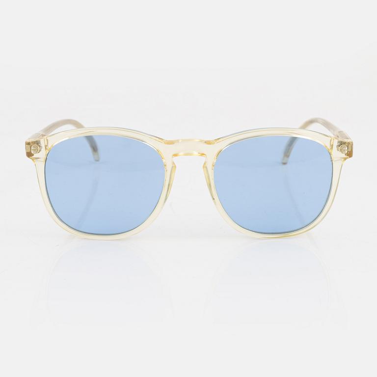 Illesteva, a pair of sunglasses.