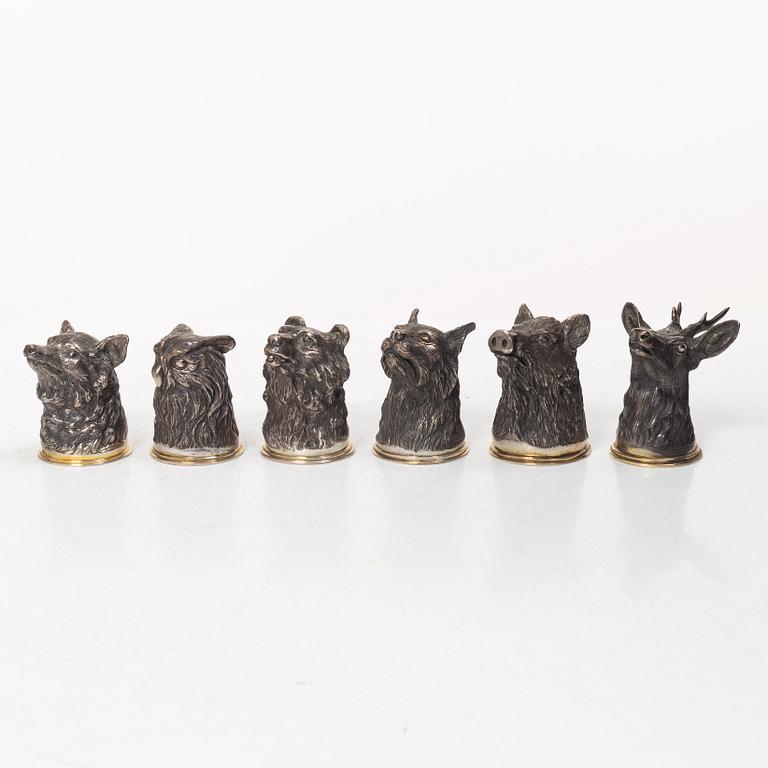 Six Russian parcel-gilt silver animal's head stirrup cups, including with mark of Nikols & Plinke, St. Petersburg.