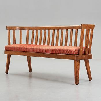 Axel Einar Hjorth, a stained pine version of "Utö" sofa, Nordiska Kompaniet, Sweden 1930's.