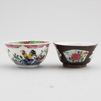 A famille rose butter tureen with cover and two cups with three odd stands, Qing dynasty, Qianlong (1736-95).