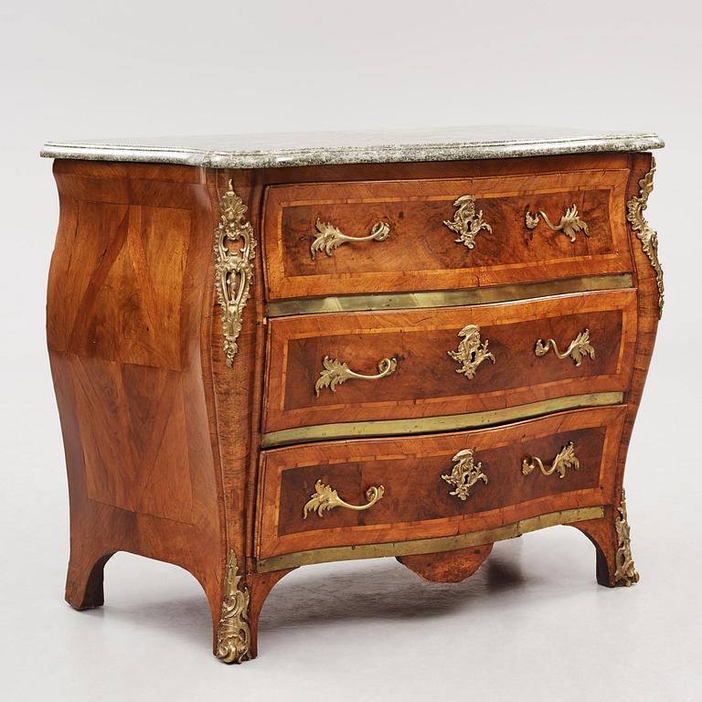 A rococo parquetry and gilt brass-mounted commode by C. Linning (master in Stockholm 1744-79).