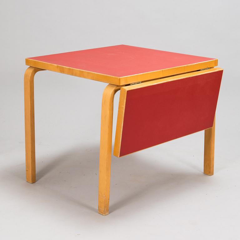 Alvar Aalto, a mid 20th century 'DL85' folding table, seven chairs for Artek.