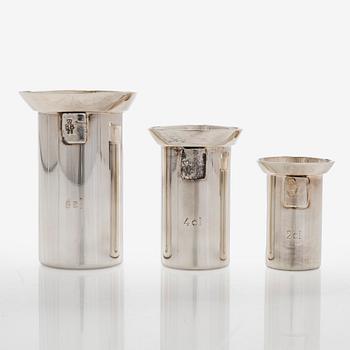 Three silver cocktail measuring cups, in a wooden box, Kultakeskus, Finland 1987-1988.