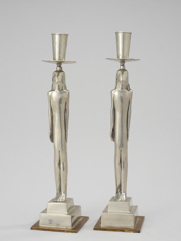 A pair of Edvin Öhrström pewter candle sticks by Svenskt Tenn 1930.