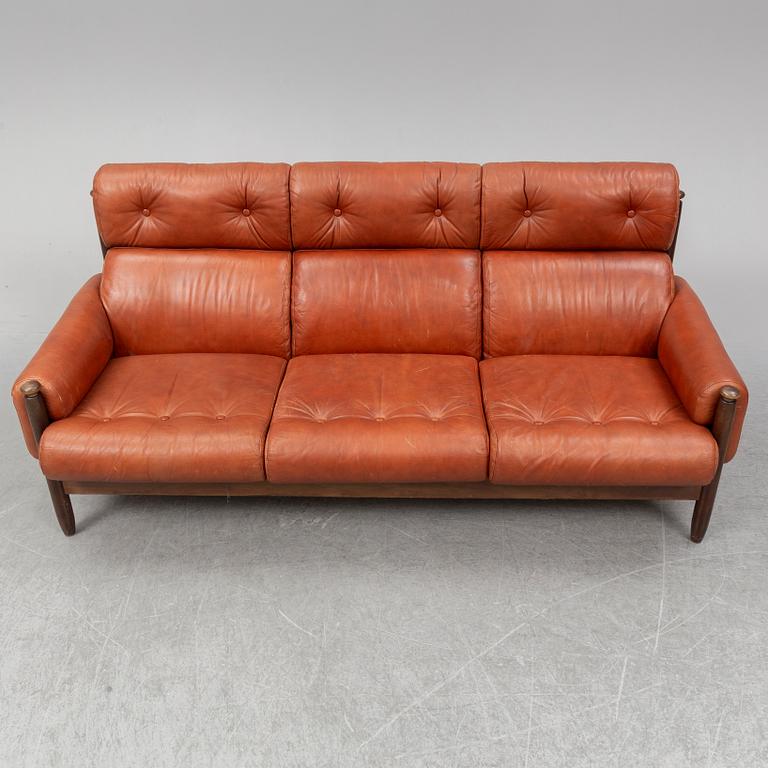 A 1960's/70's three-piece furniture suite.