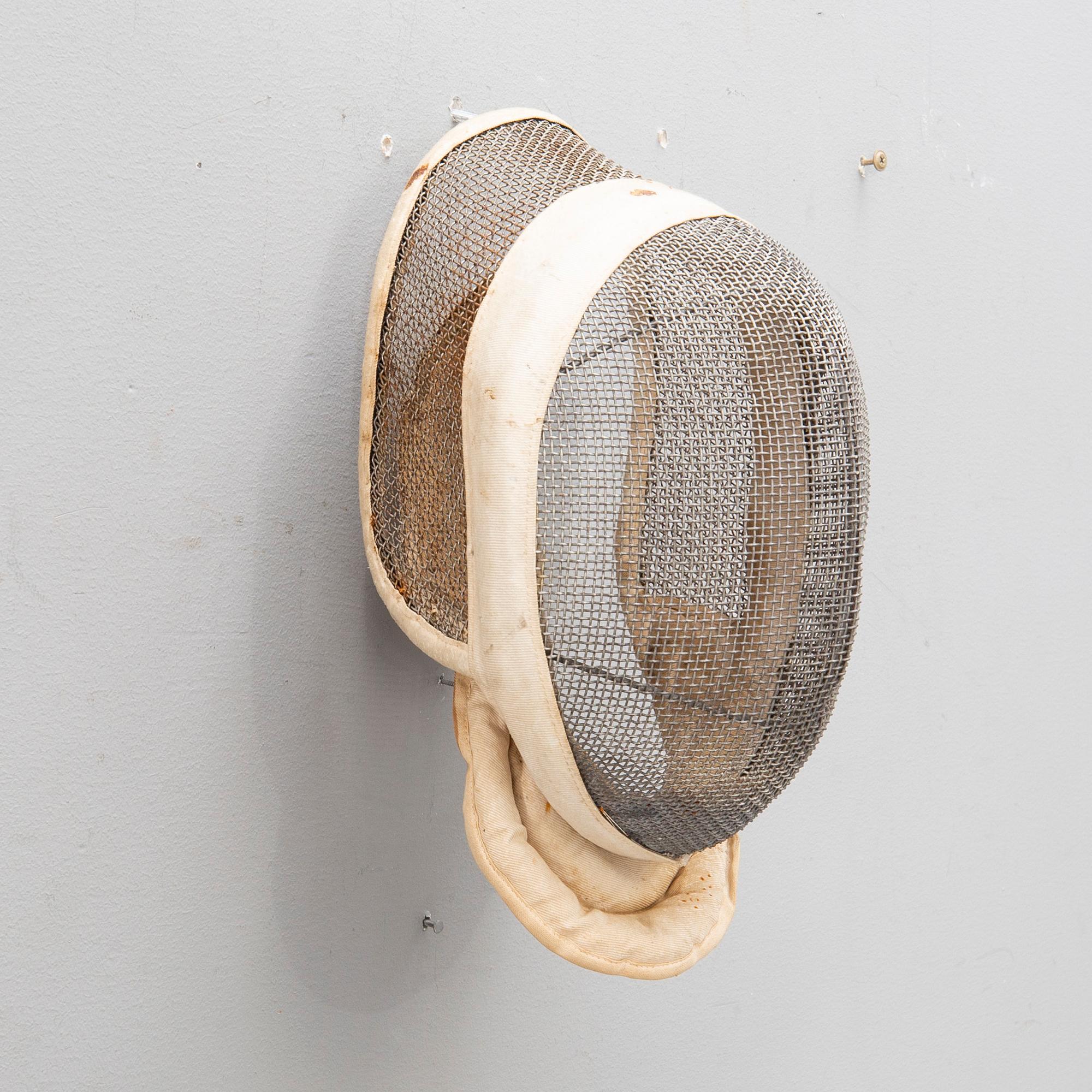 A French set of sword, mask and clothing for fencing, mid/second part of the 20th century.