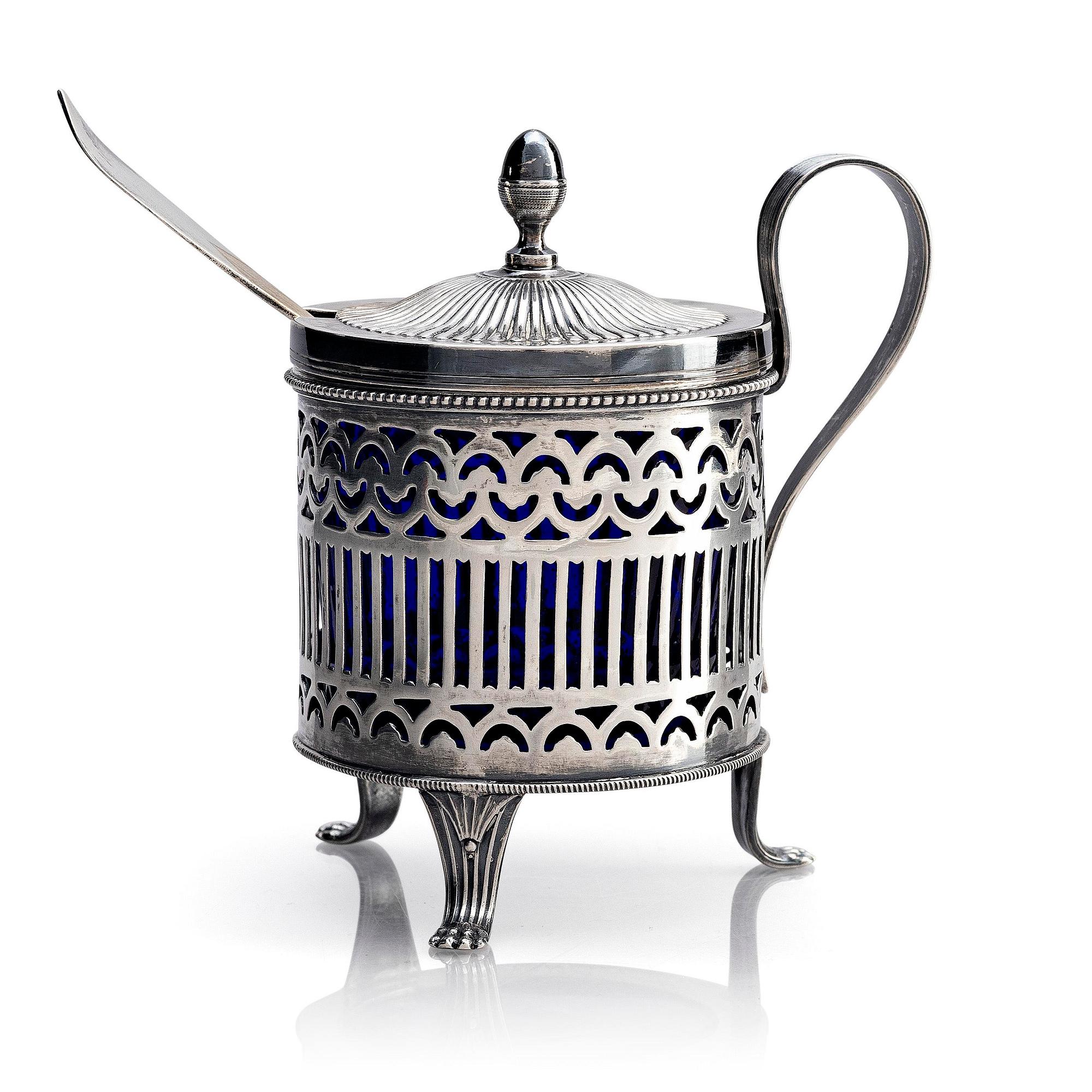 A Swedish 19th century silver mustard pot and spoon, mark of Adolf Zethelius, Stockholm 1815.