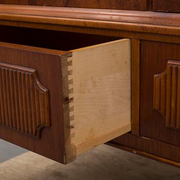 a mid 20th century mahogany cabinet.