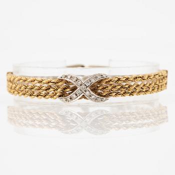 Bracelet in 18K gold with octagon-cut diamonds.