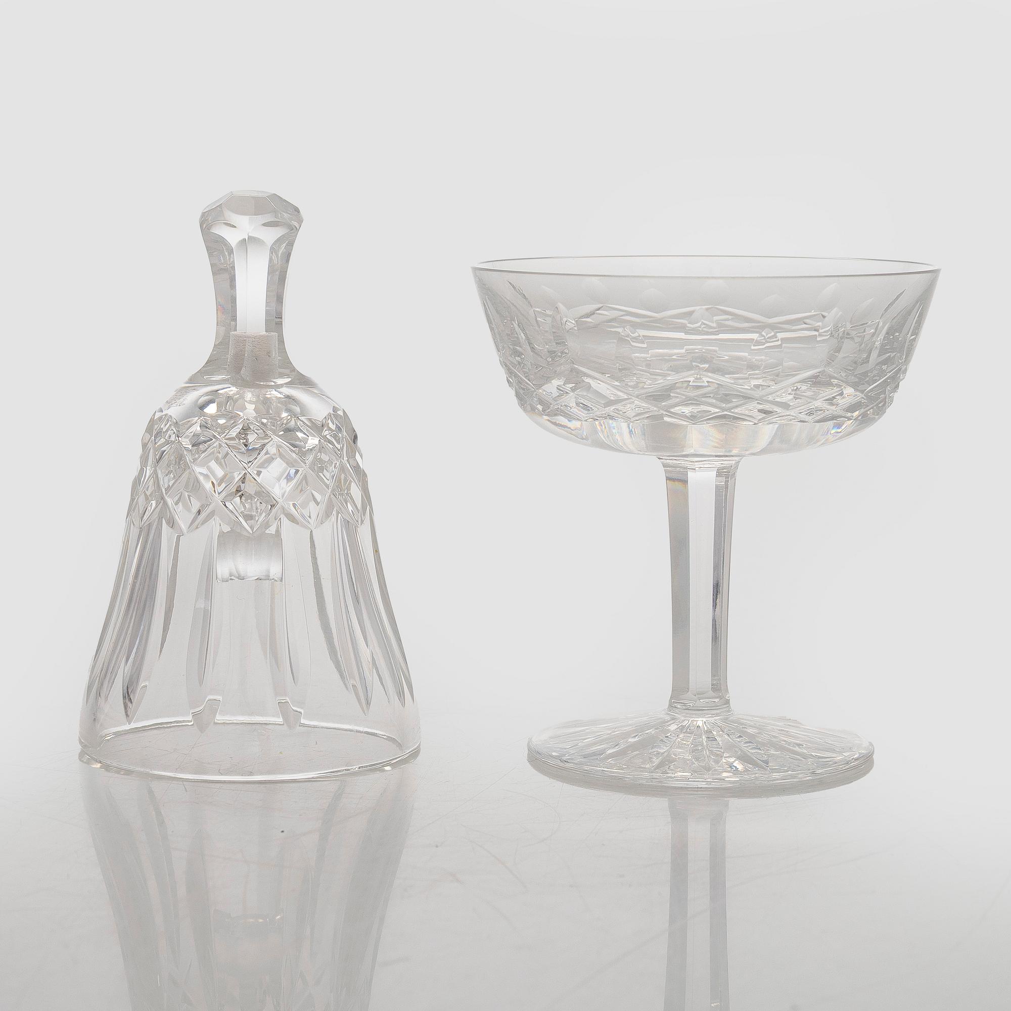 A set of 13 dessert bowls / champagne glasses, Waterford. and a table clock.