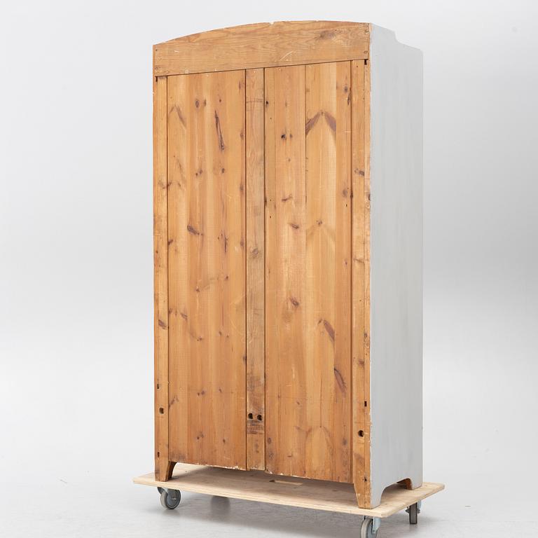 Display cabinet, early 20th century.