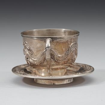 An export silver cup and saucer, probably Shanghai, early 20th century.