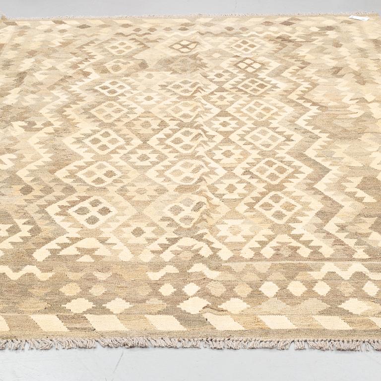 A carpet, Kilim, ca 294 x 208 cm.