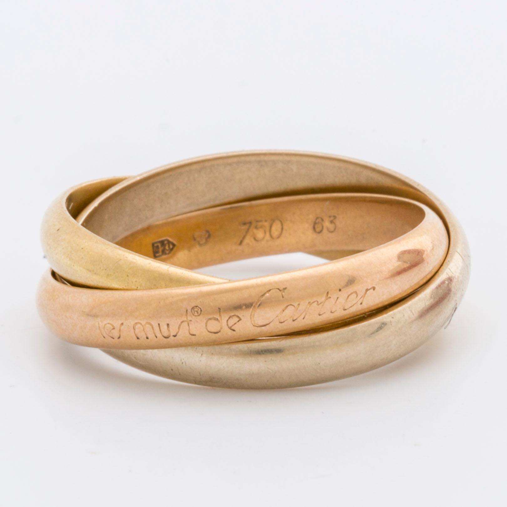 RING "Trinity" Must de Cartier, tri-coloured 18k gold, original case and certifikat.