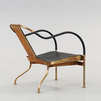 Mats Theselius, an 'El Rey' brass and leather easy chair, Källemo, Sweden.