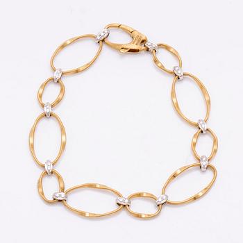 Marco Bicego Italy, bracelet 18k gold and whitegold, brilliant-cut diamonds approx 0,20 ct in total, total weight 9,8 g.