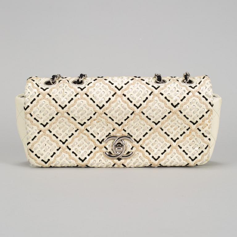 A white Chanel bag, 2010-2011.