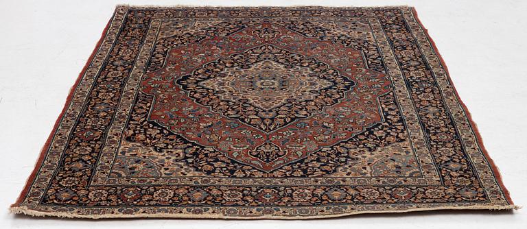 An oriental rug, c. 180 x 140 cm.