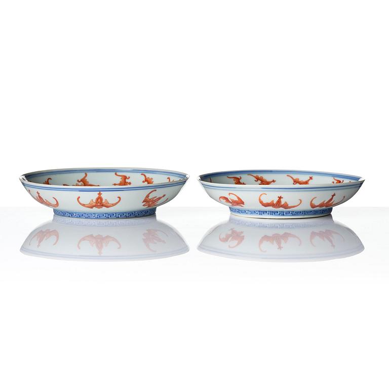 A pair of iron-red decorated 'bats' dishes, Qing dynasty, Guangxu mark and period (1875-1908).