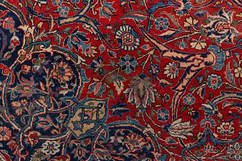 A carpet, semi-antique, Kashan, ca 443,5 x 314,5 cm.