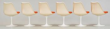 An Eero Saarinen 'Tulip' marble top table and six chairs, Knoll International.