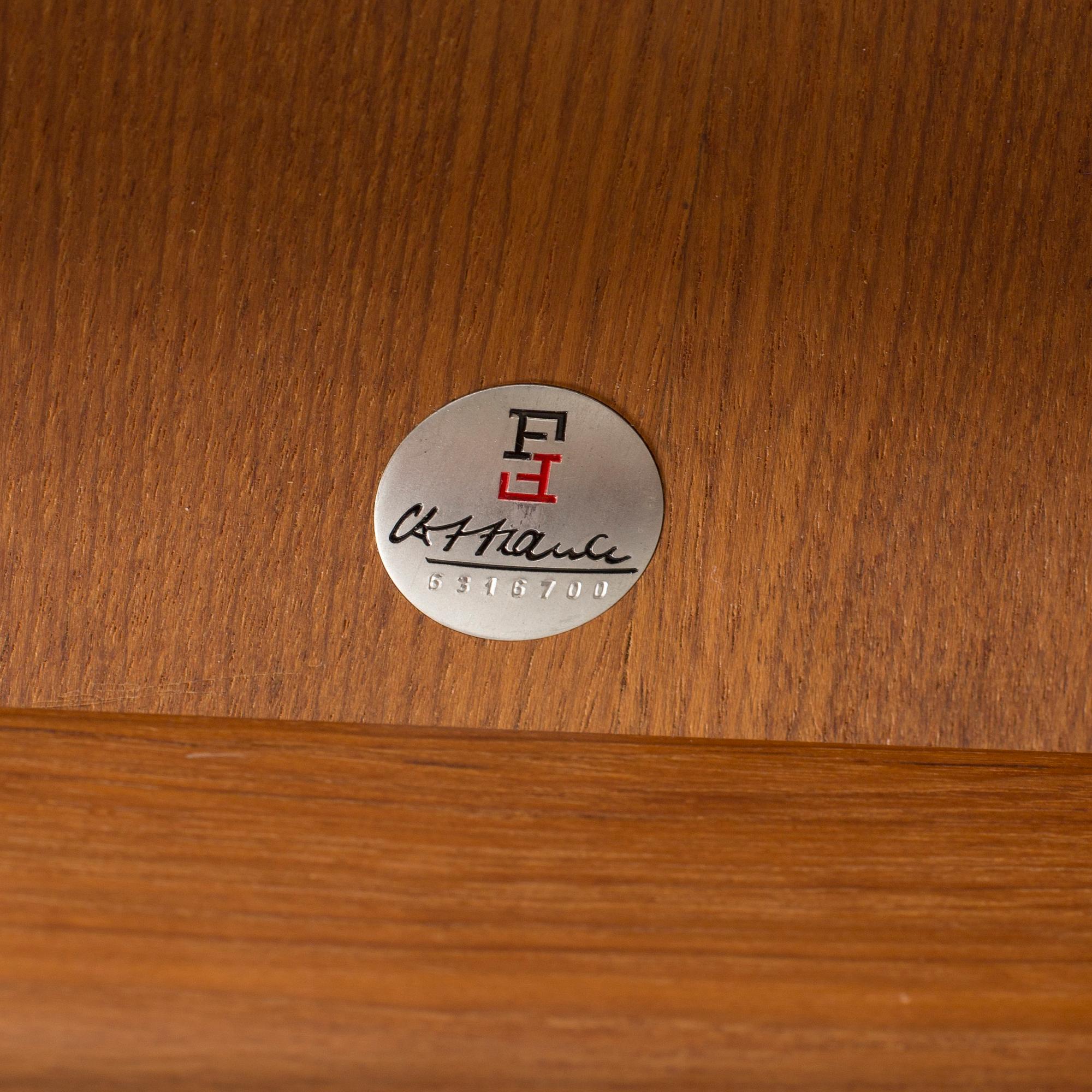 GRETE JALK, a teak coffee table fron France, Denmark, 1963.