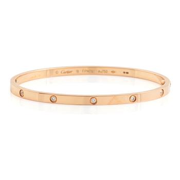 Cartier "Love" liten modell armband 18K roséguld med tio runda briljantslipade diamanter.