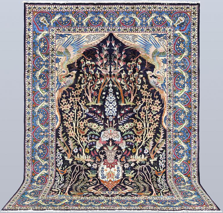 A figural Shahreza carpet, approx. 310 x 220 cm.