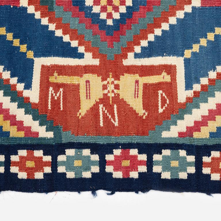 A flat weave carriage cushion, c. 116 x 48 cm, Färs district, Southwest Scania, Sweden, first part of the 19th century.