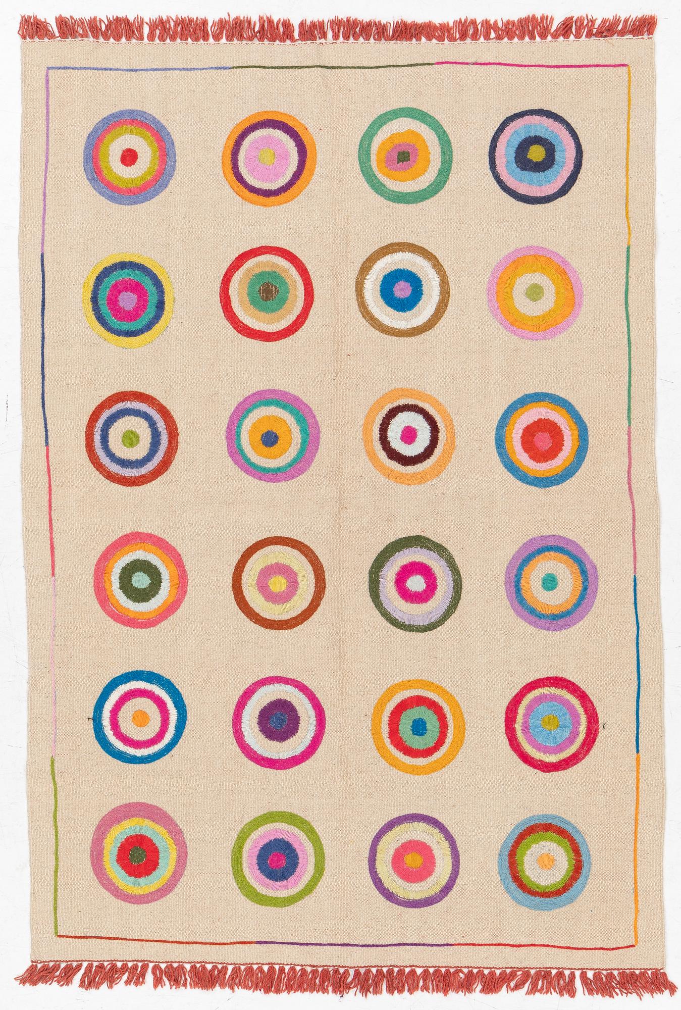 A hand-embroidered kilim rug, c. 183 x 125 cm.