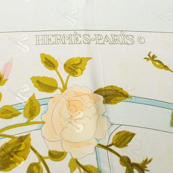 Hermès, a 'Romantique' silk scarf.