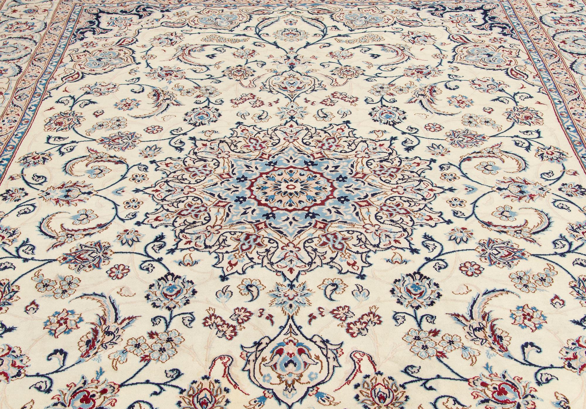A carpet, Nain, part silk S.K 9LAA. Circa 352x248 cm.