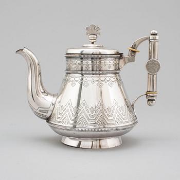 A Russian 19th century parcel-gilt silver tea pot and cream jug, mark possbly of Alexander Lokin, St. Petersburg 1893.