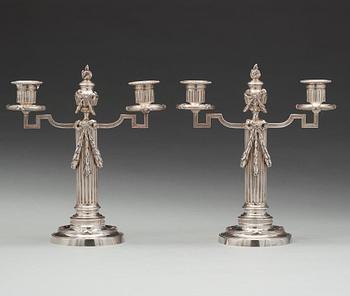 A pair of Fabergé, silver candelabra, workmaster Julius Rappoport, S.t Petersburg before 1899.