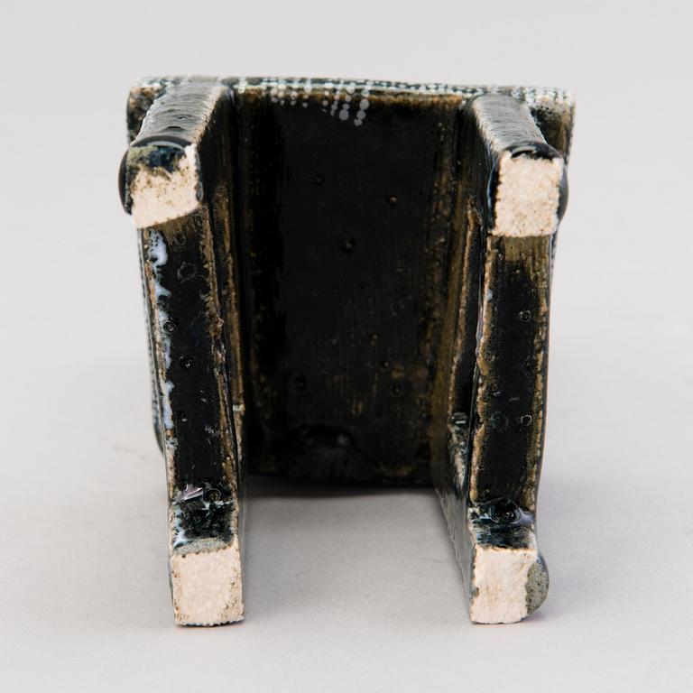 HEINI RIITAHUHTA, a porcelain miniature sculpture 'Chair' signed Heini Riitahuhta.