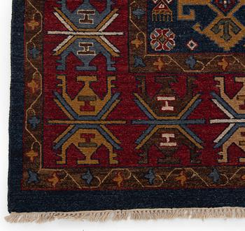 A carpet, Ushaq Design, ca 368 x 269 cm.