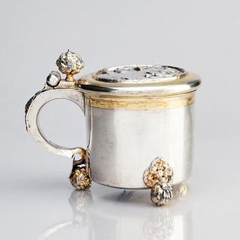 A Swedish parcel-gilt silver tankard, mark of Erik Månsson Schmidt, Stockholm (active 1675-1686).