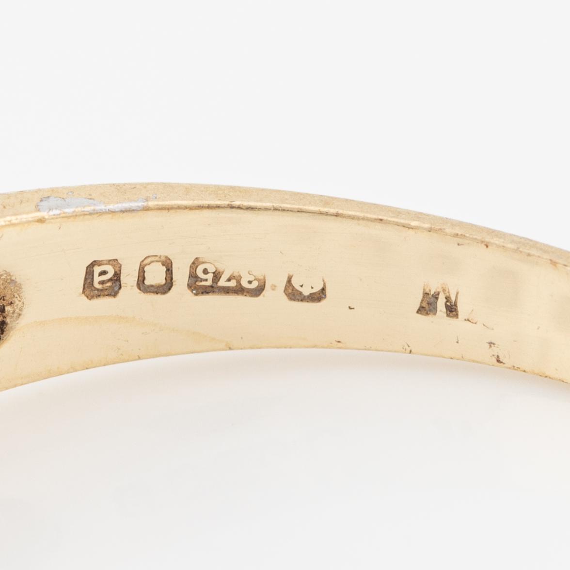 Ring  tvåradig med gula briljantslipade diamanter.