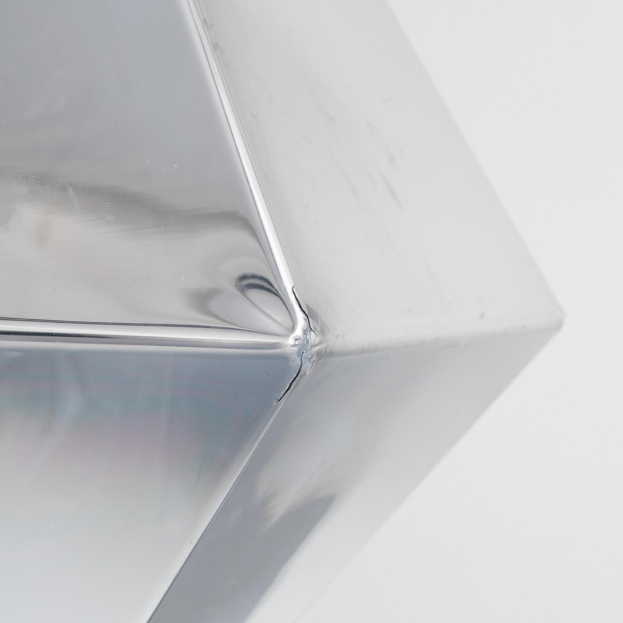 Tom Dixon, a 'Cut' ceiling lamp.