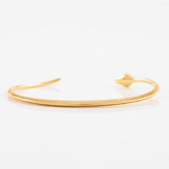 An Ole Lynggaard bracelet 18K gold in the shape of a snake.