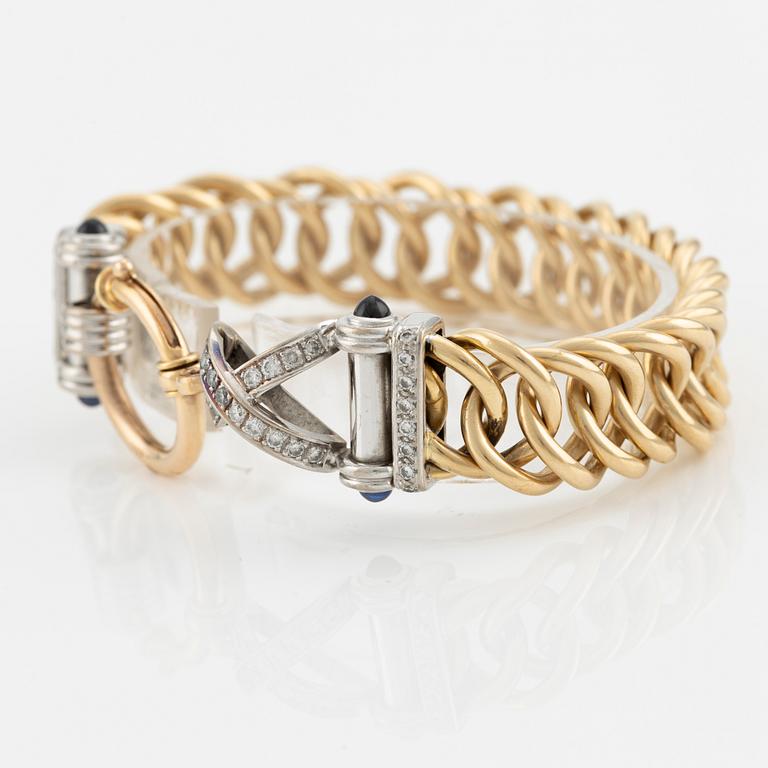 Armband 18K guld med runda briljantslipade diamanter samt safirer.