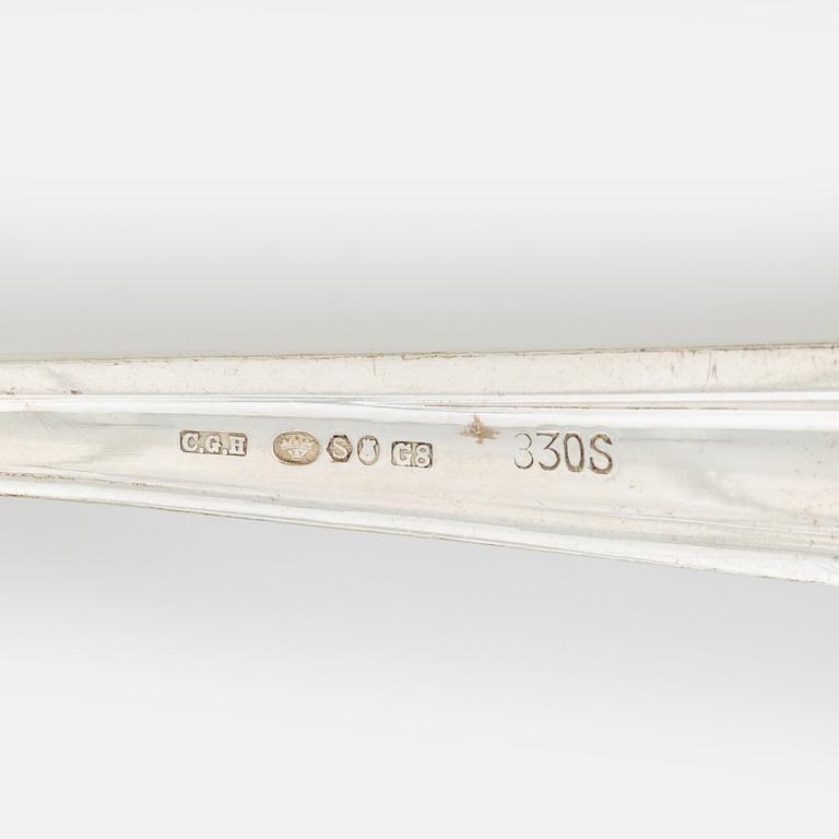 A 120- piece silver cutlery, bearing Swedish import marks, including CG. Hallberg, Stockholm, 1932.