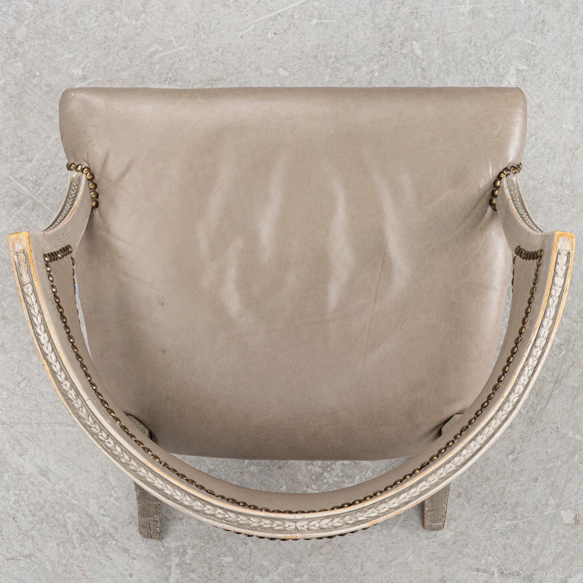 A late Gustavian style armchair, early 20th Century.