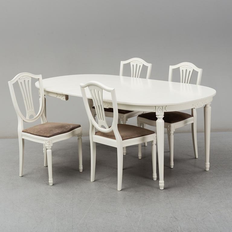 A dining table and four chairs, Gustavian style, second half of the 20th century. One leaf included.