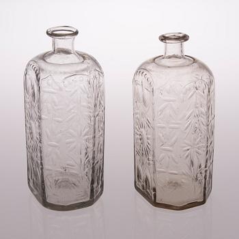 Two 18th century Baroque glass bottles.