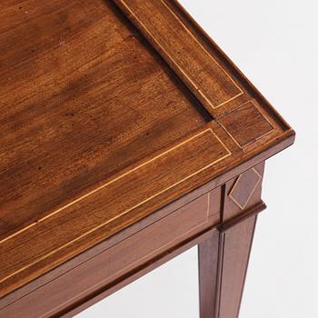 A late Gustavian mahogany table attributed to L. Qvarnberg (master in Stockholm 1801-1813).