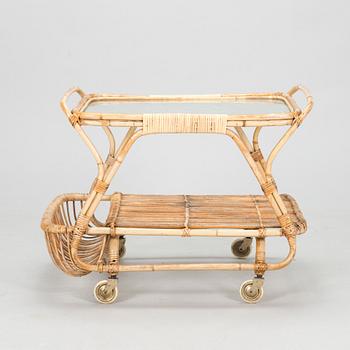 A mid 1900s bamboo and rattan serving trolley.