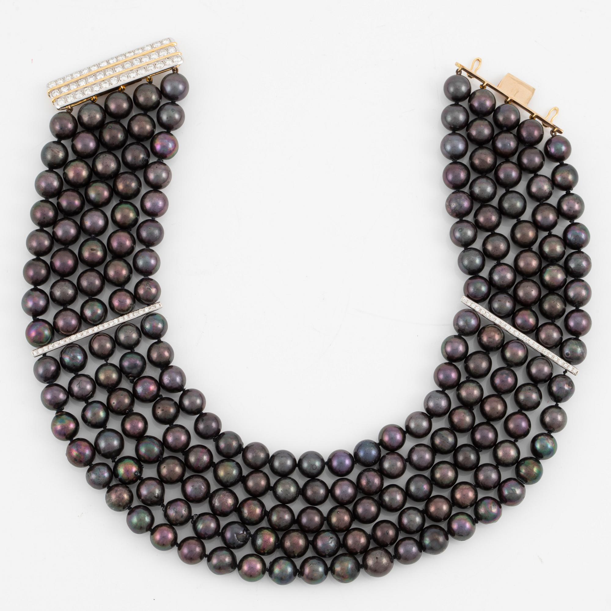 Necklace, five-row with cultured black pearls, 18K gold and white gold with brilliant-cut diamonds.