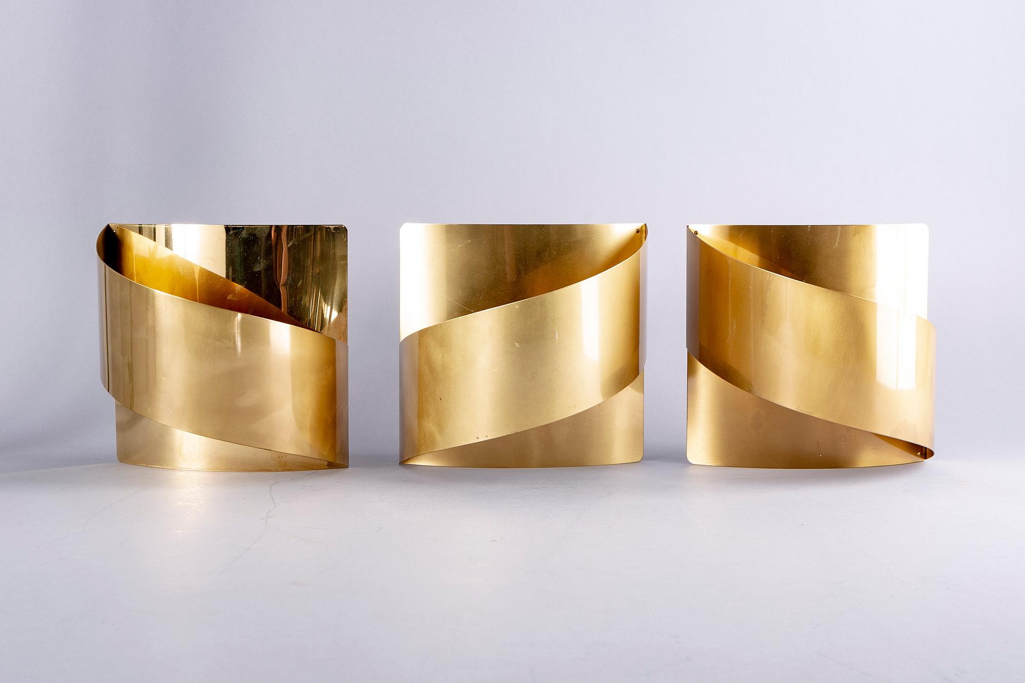 A set fo six Peter Celsing brass "Band" wall lamps Falkenberg 1960/70s.